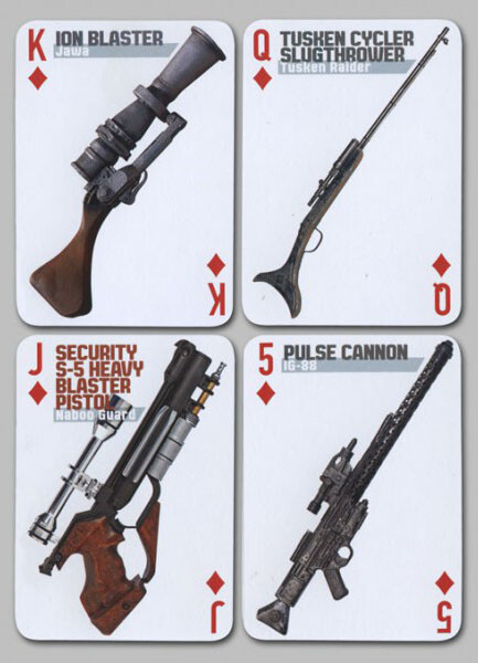 Quatre cartes à jouer carreau avec armes blaster et sabre laser