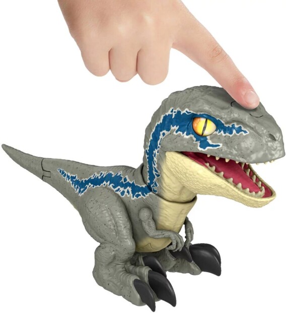Pression sur la tête du dinosaure pour activer sa mâchoire et son rugissement