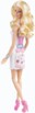 Poupée stylisme Barbie en robe blanche imprimé Hello Kitty et colliers superposés
