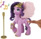 Appuie sur la marque de beauté du poney Rose qui chante