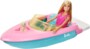 Poupée Barbie dans son bateau et avec son chiot
